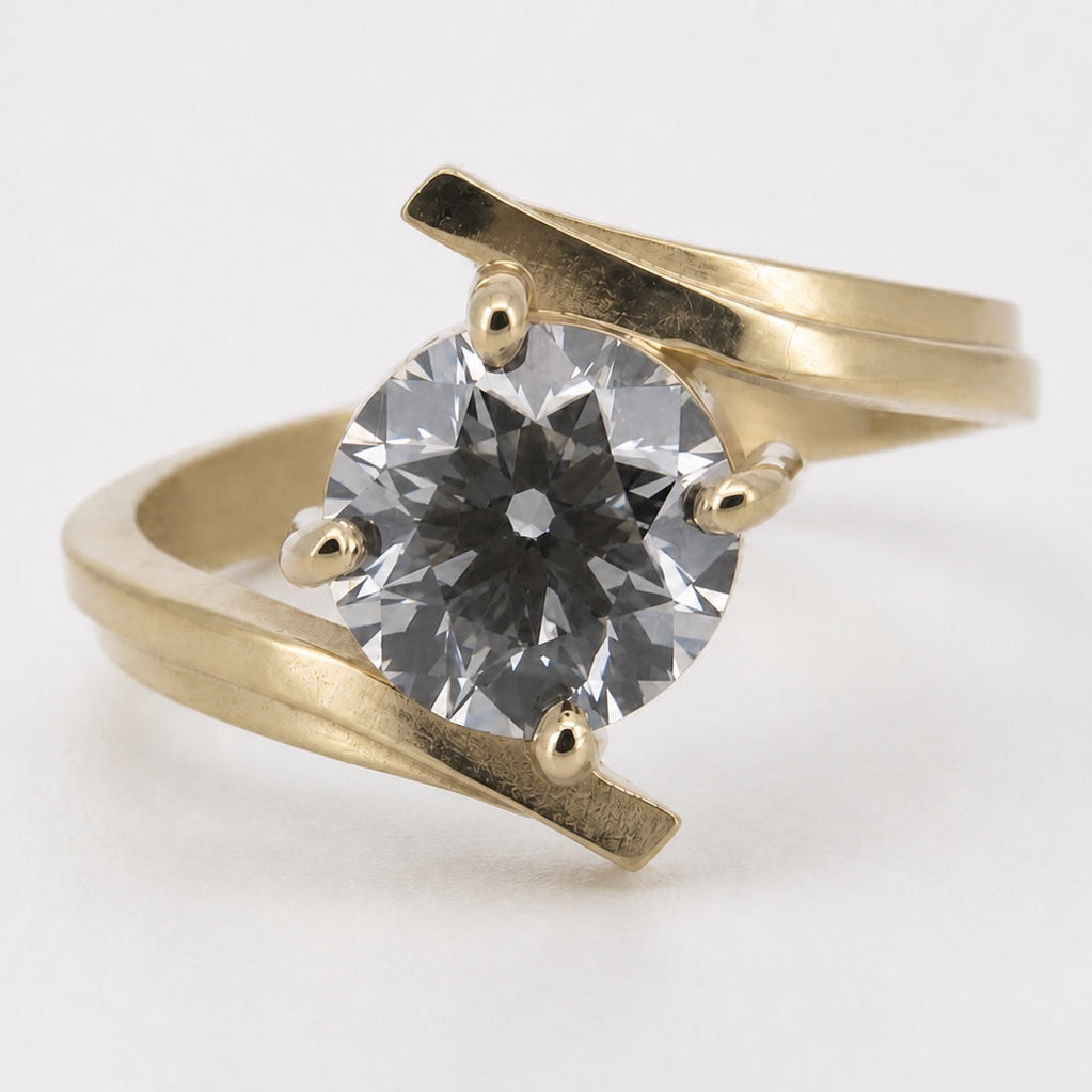 Round lab-grown diamond bypass engagement ring in 14K yellow gold, close front view