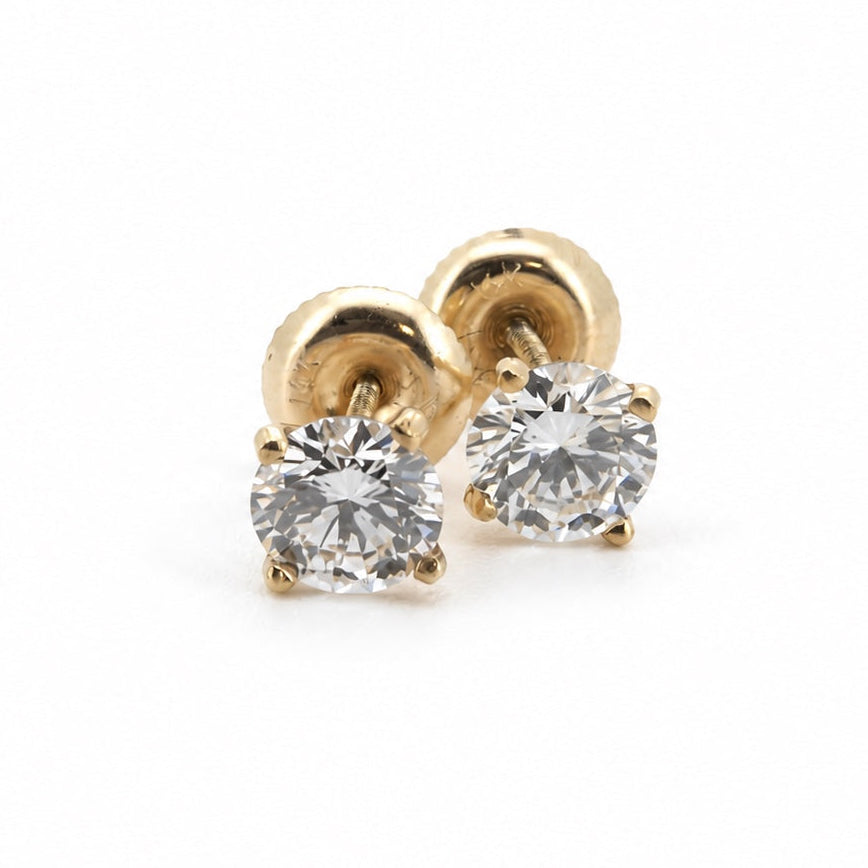 Round solitaire stud earrings in 14K gold, close front view