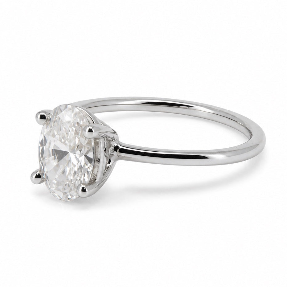 Oval lab-grown diamond solitaire engagement ring in 14K white gold, opposite three-quarter view