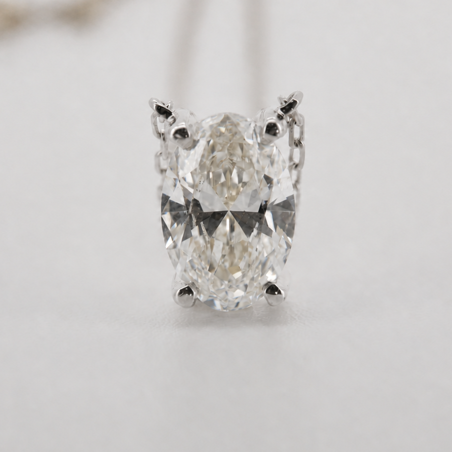 White-gold visualization of the oval diamond pendant necklace, front macro view #Metal_14K White Gold