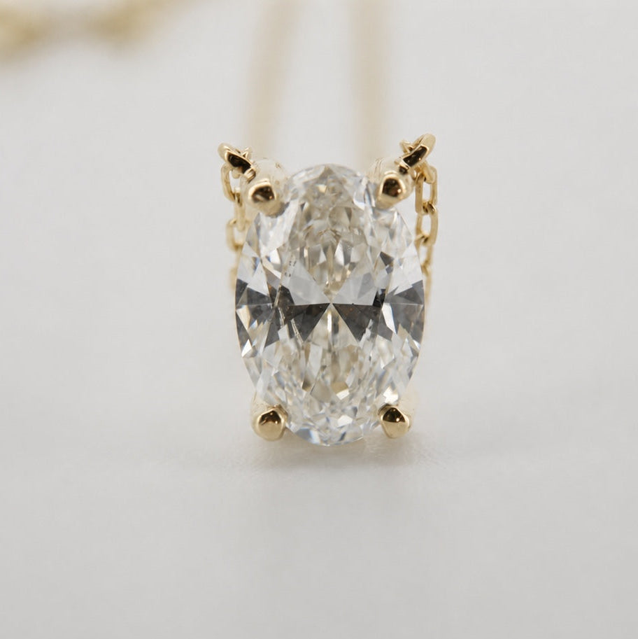 Oval lab-grown diamond pendant necklace in 14K yellow gold, front macro view #Metal_14K Yellow Gold