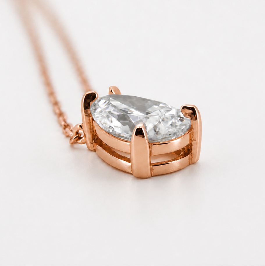 Rose-gold visualization of the pear-cut diamond pendant necklace, three-quarter side profile #Metal_14K Rose Gold