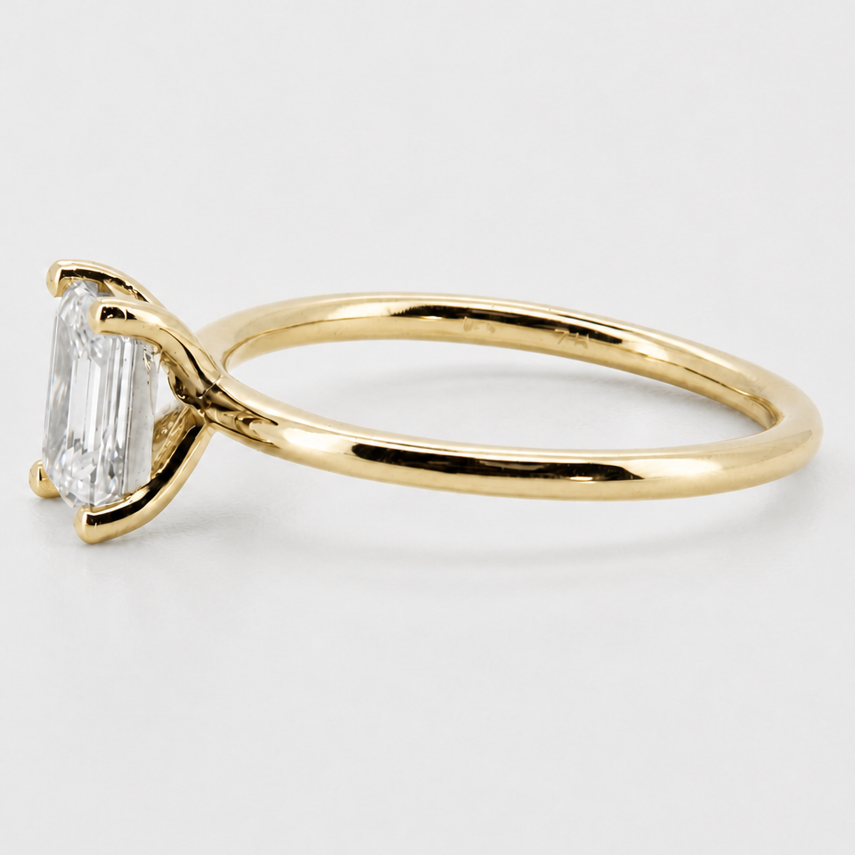 Yellow-gold visualization of the emerald-cut solitaire engagement ring, side profile #Metal_14K Yellow Gold