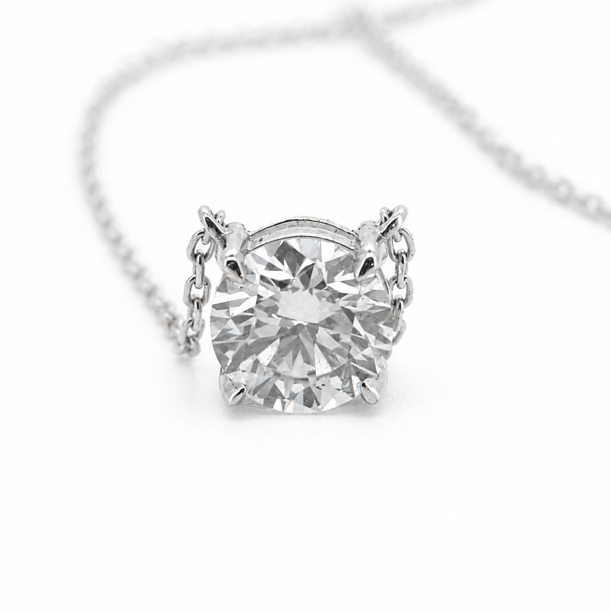 PESO 10061 round solitaire pendant necklace, front view, 14K white gold