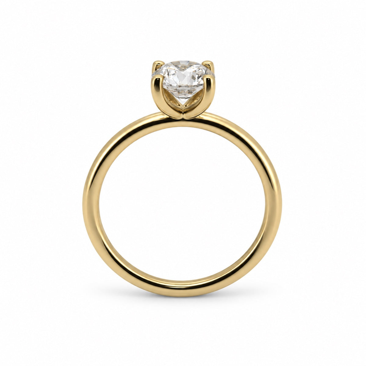 Round solitaire engagement ring in 14K yellow gold, side profile