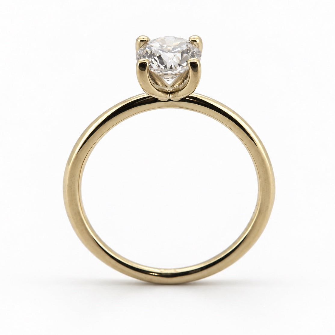 PESO 10064 round solitaire ring, front basket view, 14K yellow gold
