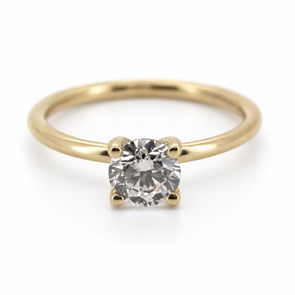 PESO 10064 round solitaire ring, front view, 14K yellow gold