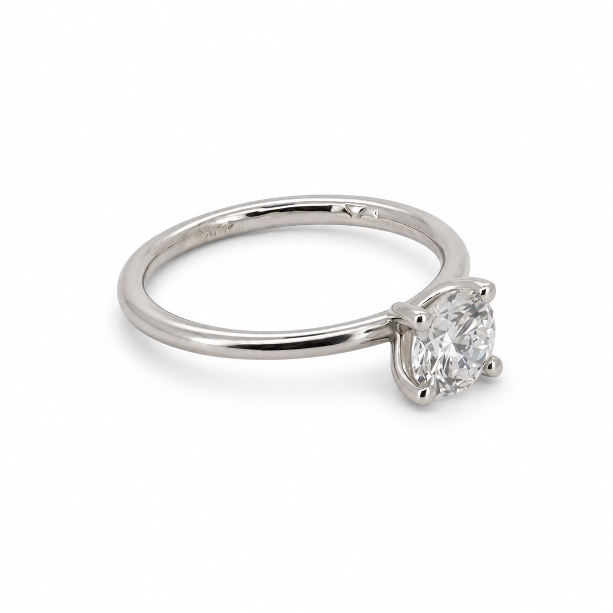 PESO 10065 round solitaire ring, three-quarter view, 14K white gold