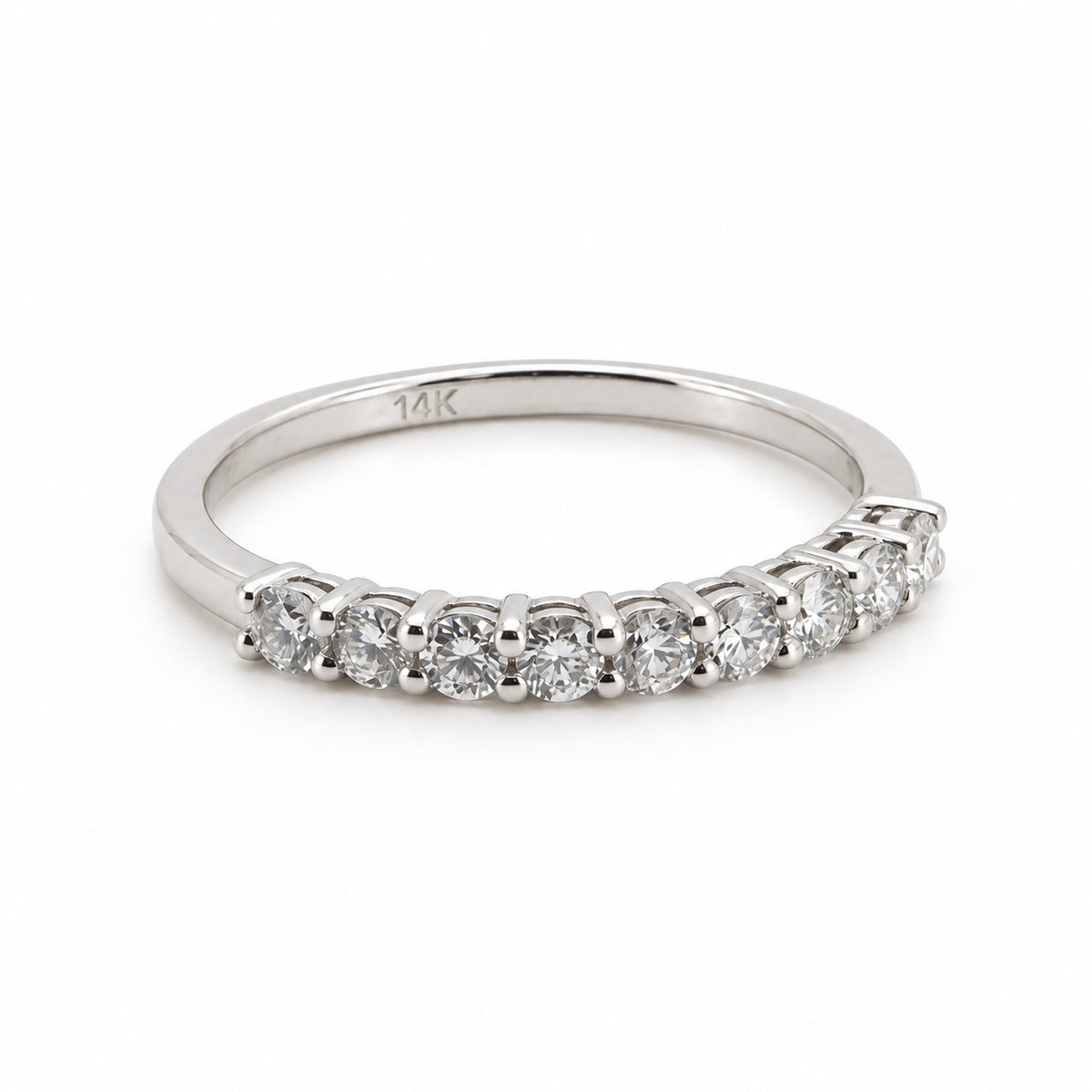 Curved nine-stone ring in 14K white gold, three-quarter view
