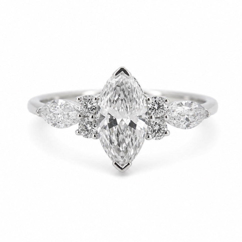 Front view of the marquise and pear three-stone ring