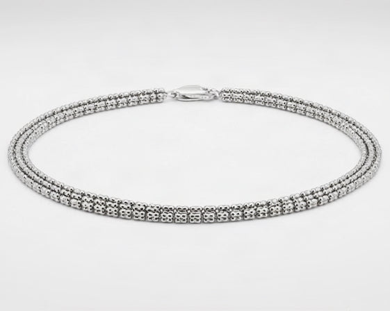 Full view of the three-row beaded bracelet in 14K white gold with lobster clasp