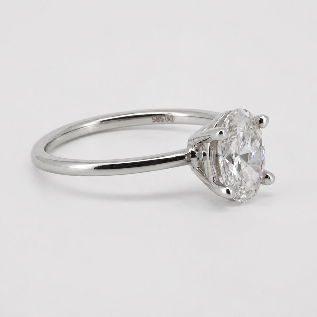 Oval lab-grown diamond solitaire engagement ring in 14K white gold, side three-quarter view