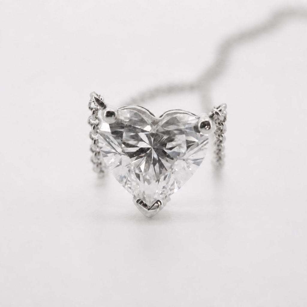 Front view of a heart solitaire pendant necklace in 14K white gold