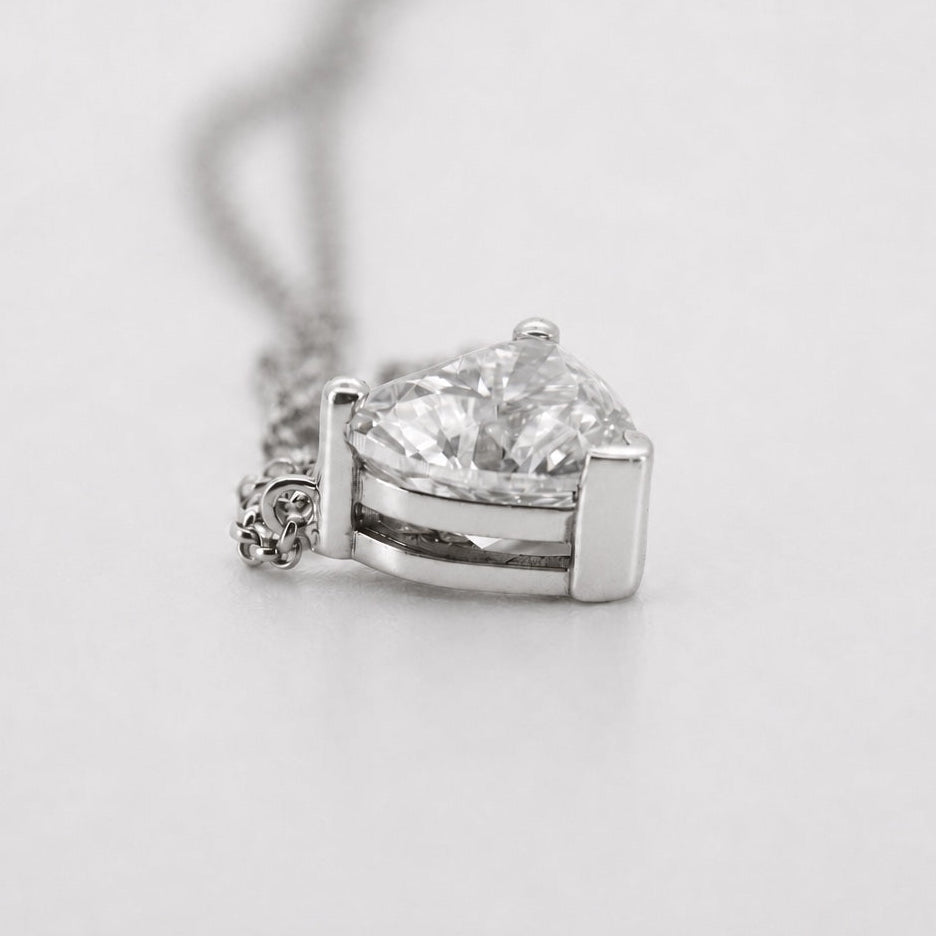 Side view of a heart solitaire pendant necklace in 14K white gold
