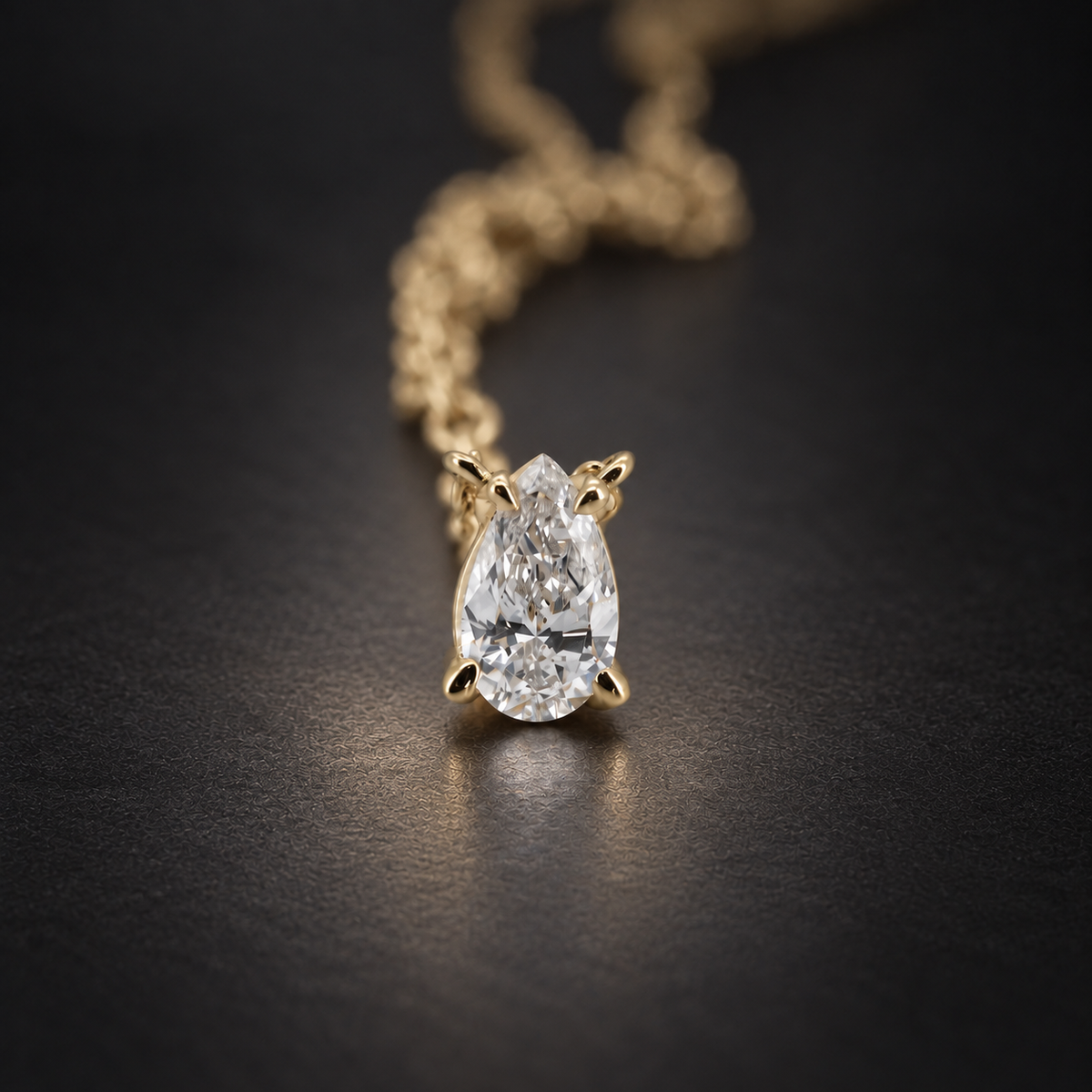 PESO 10051 pear pendant on a charcoal background — AI-assisted product illustration.
