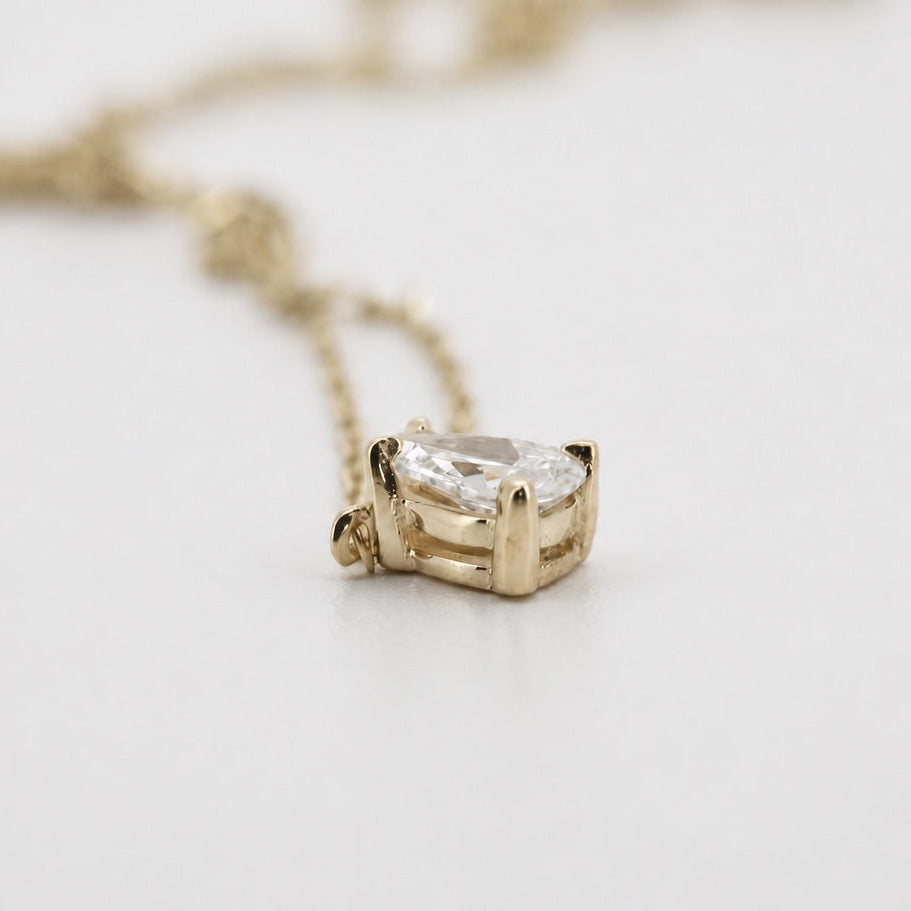 Pear-shaped lab-grown diamond solitaire pendant necklace in 14K gold, side view