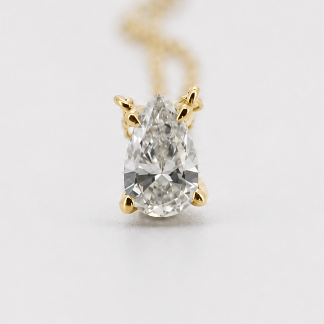 Yellow-gold visualization of the pear-shaped solitaire pendant necklace, front view #Metal_14K Yellow Gold
