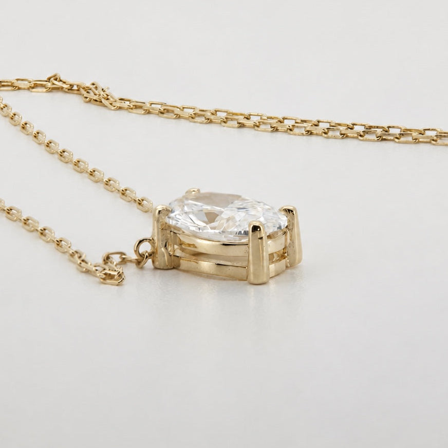 Oval lab-grown diamond pendant necklace in 14K yellow gold, side profile #Metal_14K Yellow Gold