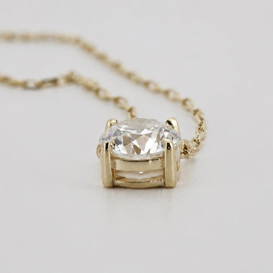 Round diamond pendant necklace in 14K yellow gold, side profile #Metal_14K Yellow Gold