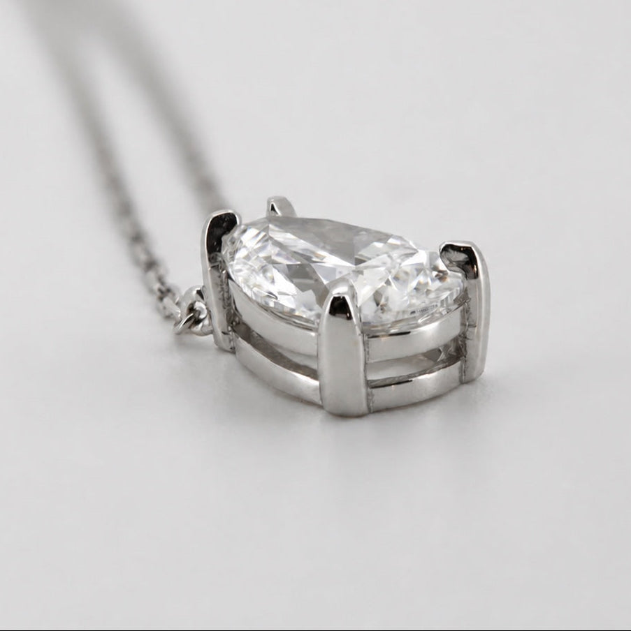 Pear-cut diamond pendant necklace in 14K white gold, three-quarter side profile #Metal_14K White Gold
