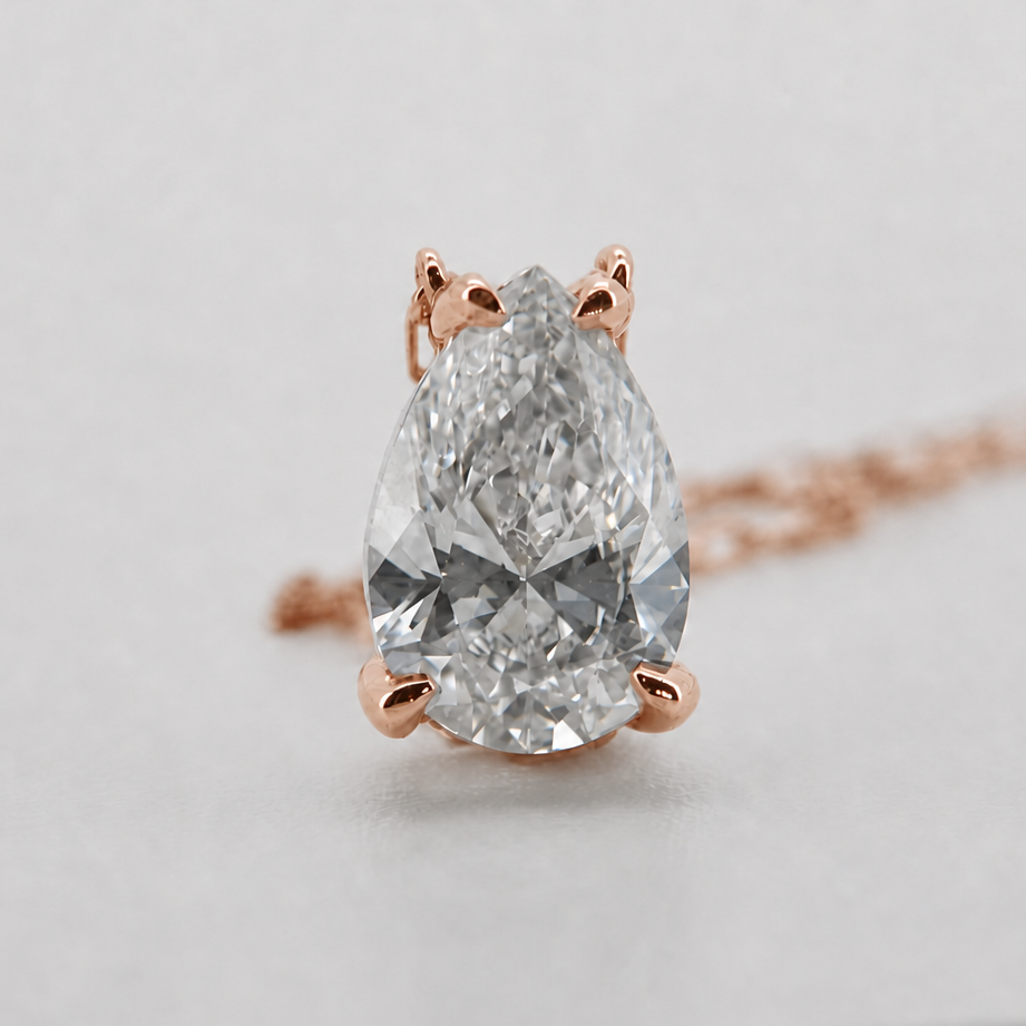 Rose-gold visualization of the pear-cut diamond pendant necklace, front macro view #Metal_14K Rose Gold