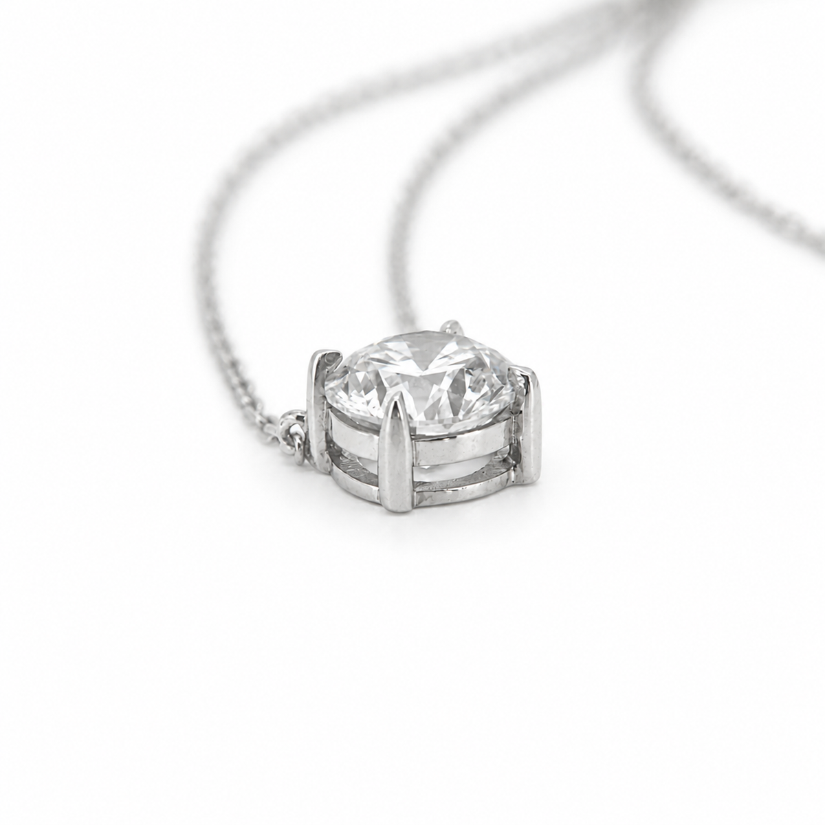 PESO 10061 round solitaire pendant necklace, side view of the setting and basket, 14K white gold