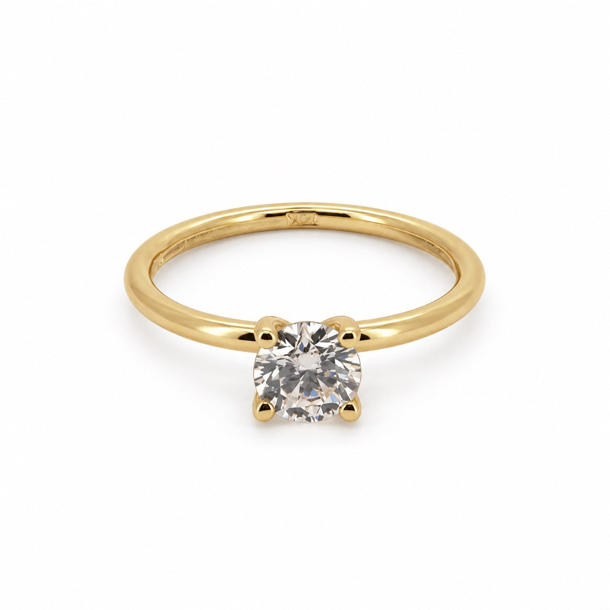 Round solitaire engagement ring in 14K yellow gold, front view