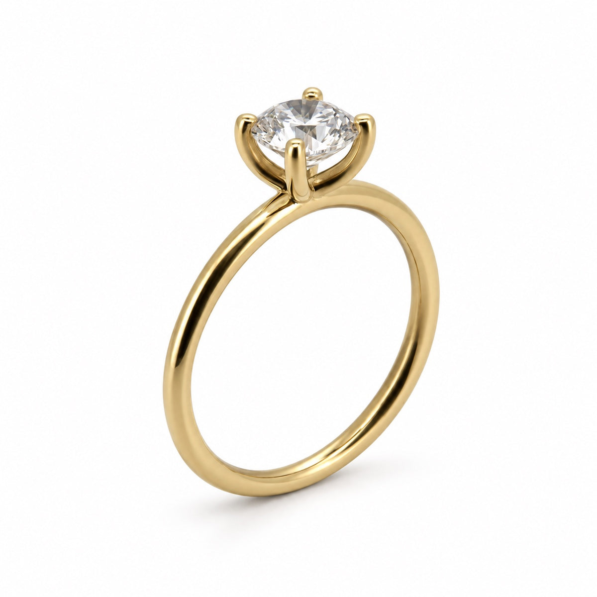 Round solitaire engagement ring in 14K yellow gold, three-quarter side profile