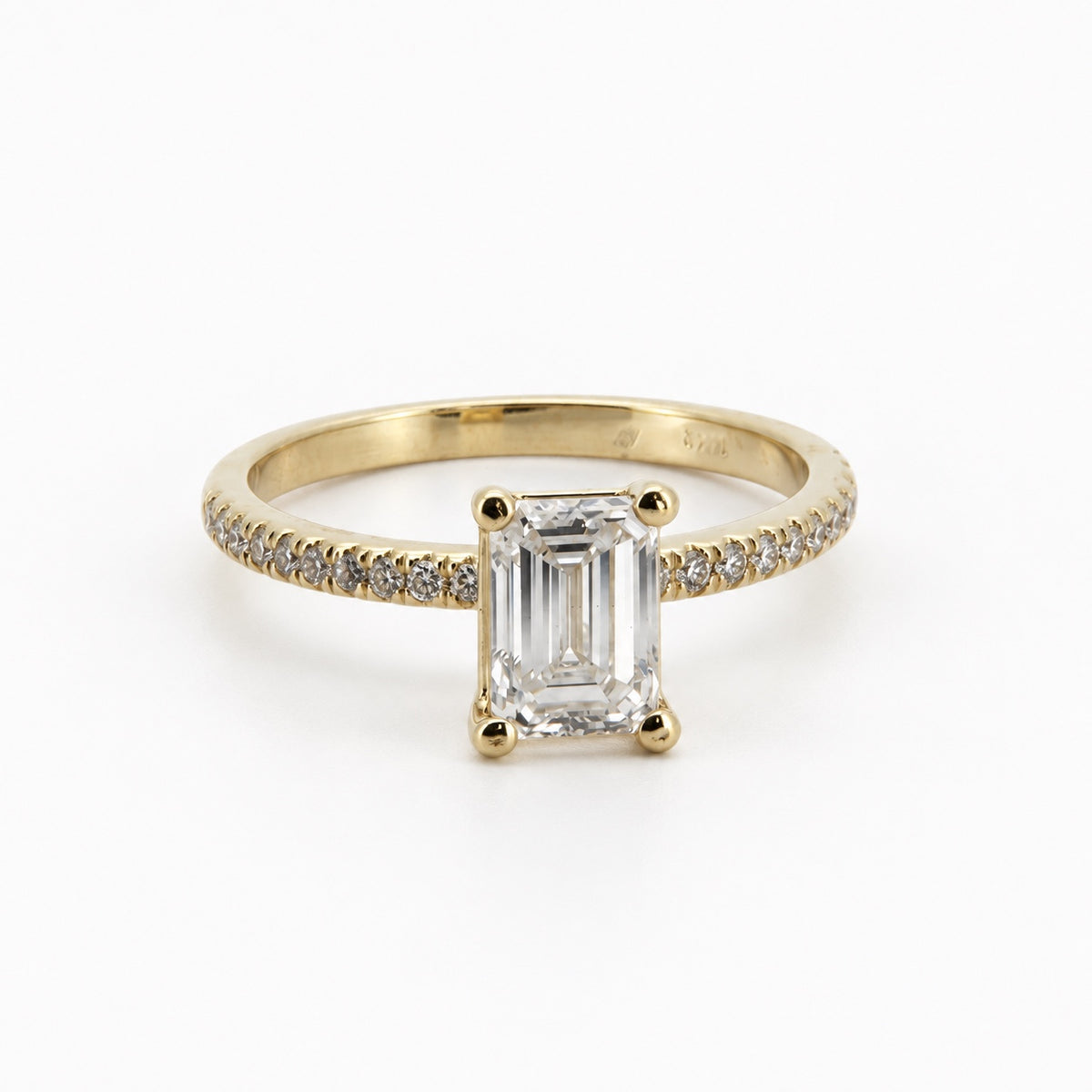 Emerald Solitaire Engagement Ring with Stone-Set Band