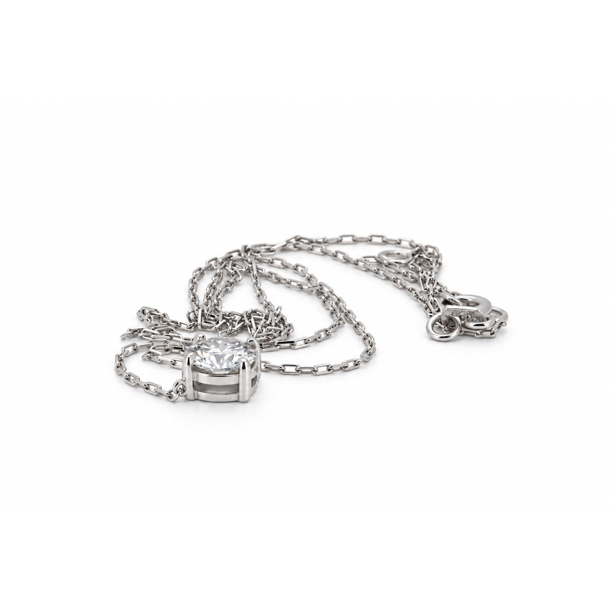 Round solitaire pendant necklace in white-tone metal