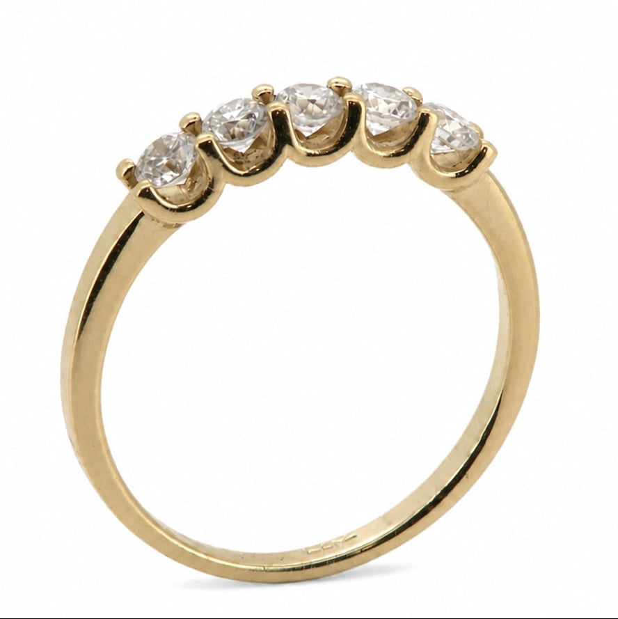 Rear view of the five-stone round 14K yellow gold ring