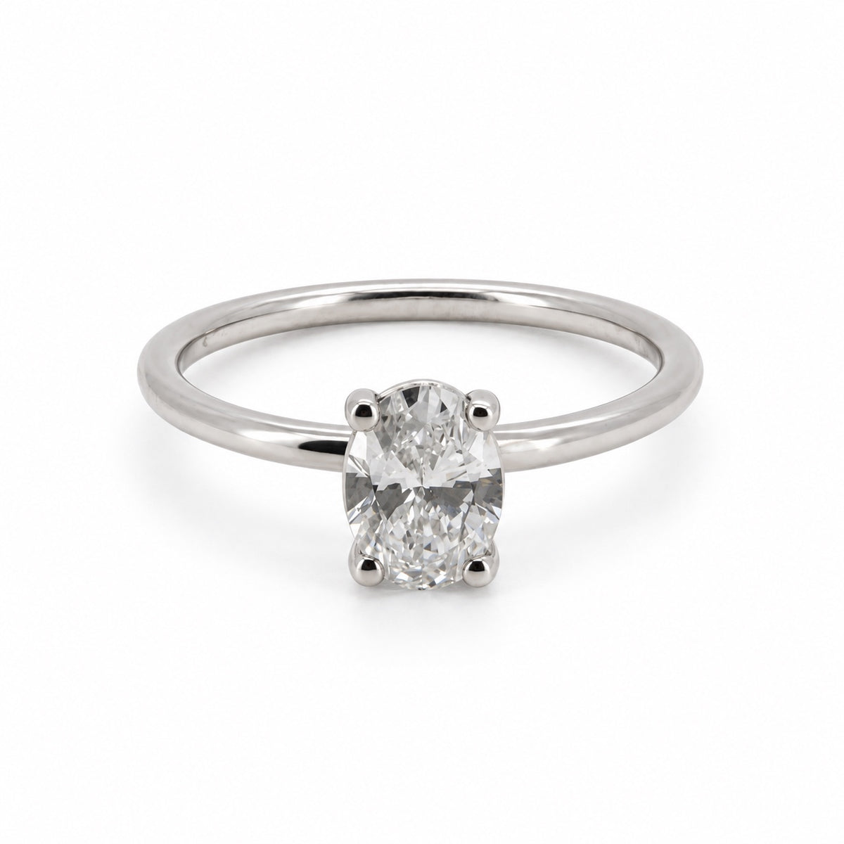Oval solitaire engagement ring, view 1